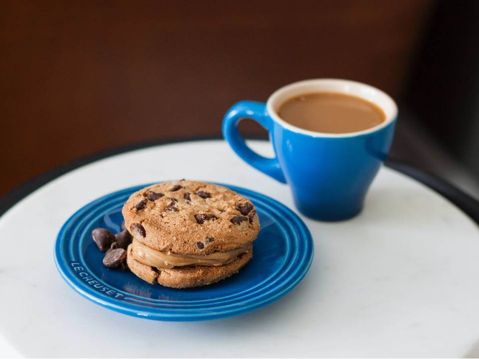 chocolate chip cookies and a warm drink